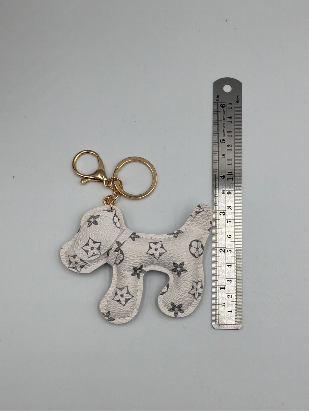 Designer Inspired White Puppy Keychain with Gold Hardware - Picture 3 of 3